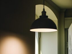 black pendant lamp near window and door