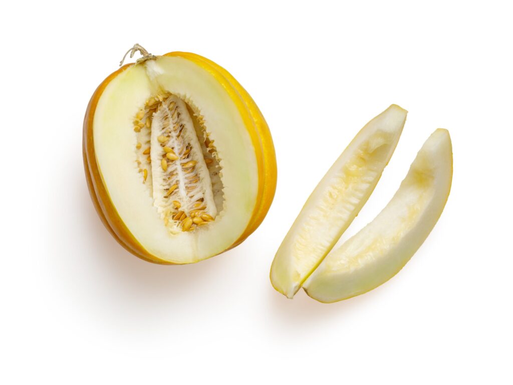 sliced yellow fruit on white background