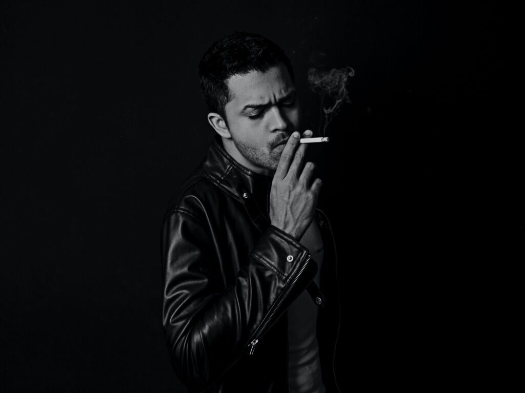 sexy man smoking cigarette