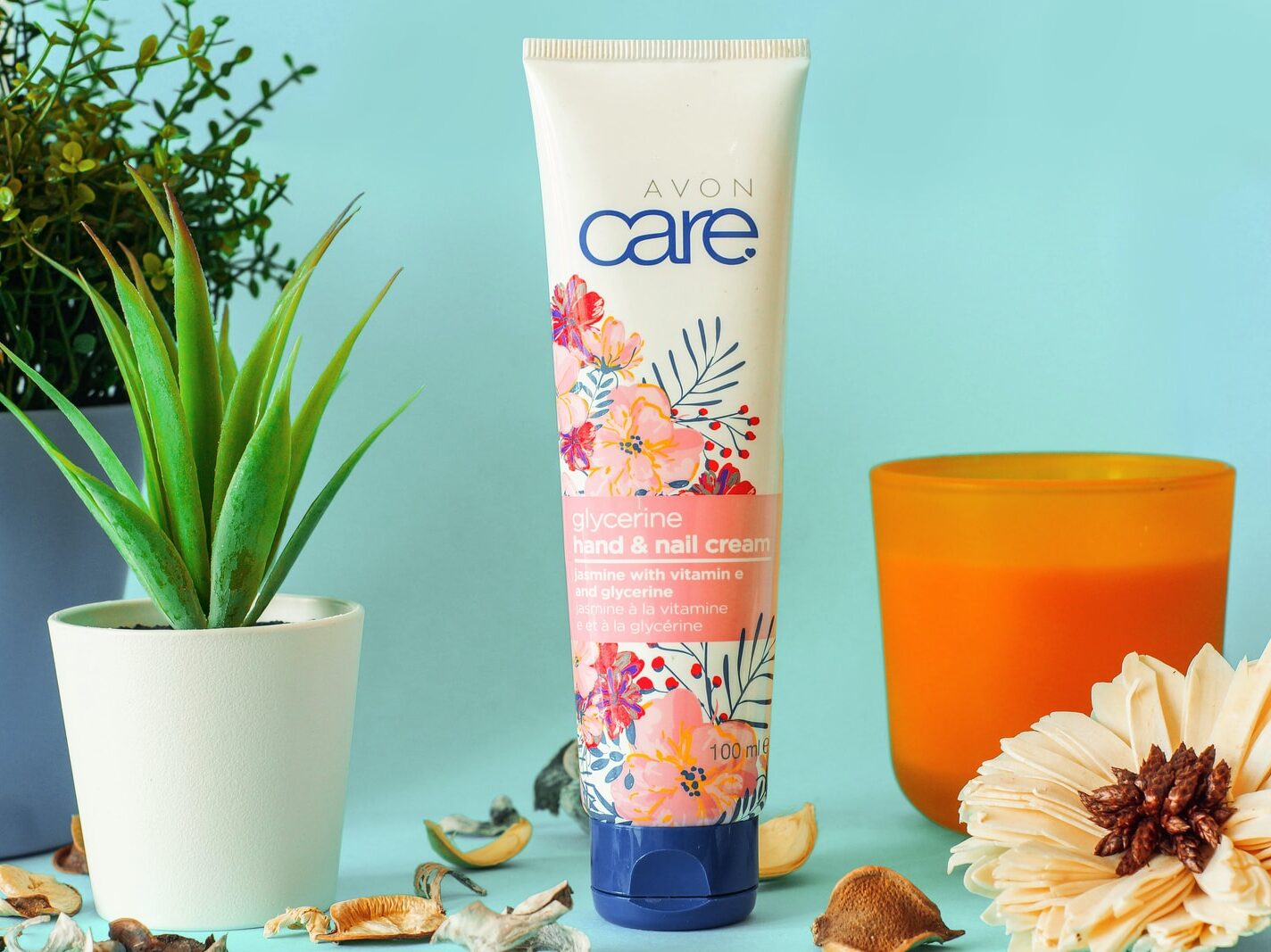 white and pink plastic tube bottle