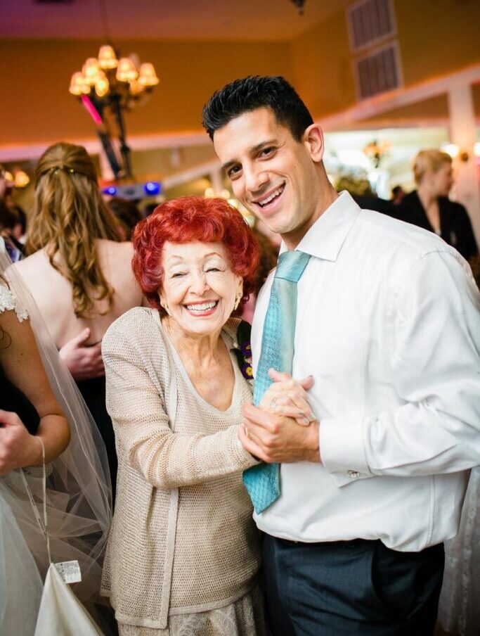 man and grandmother dancing