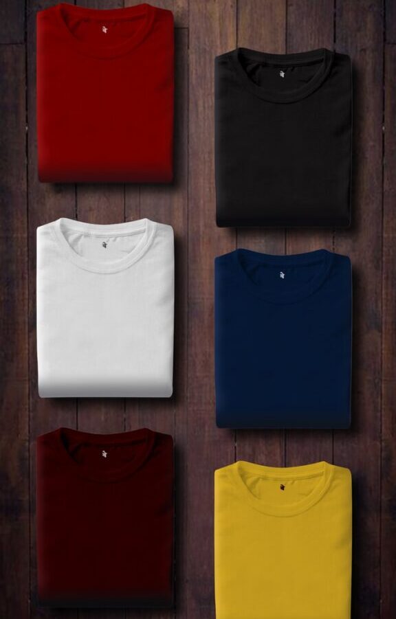 assorted color folded shirts on wooden panel