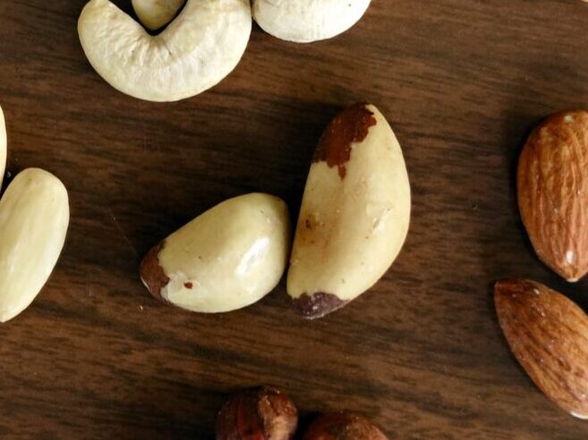Photo by Marta Branco - ČasProŽeny.cz Variety of Brown Nuts on Brown Wooden Panel High-angle Photo