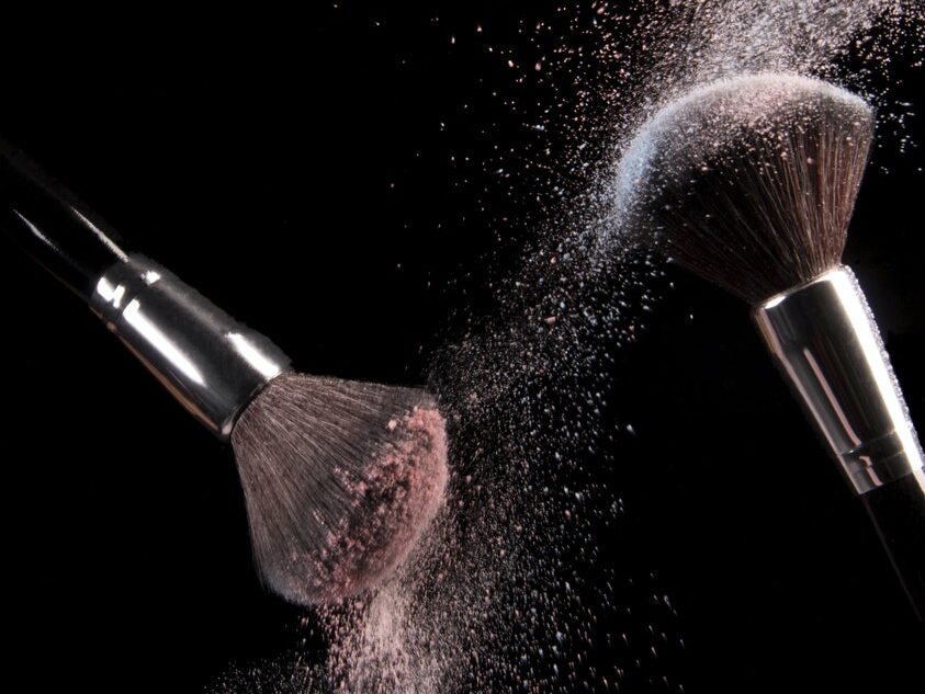 Cosmetics Makeup Brushes and Powder Dust Explosion