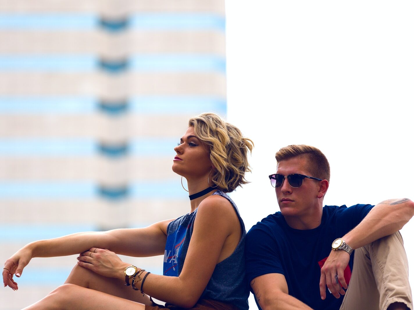 man and woman sitting posing for photo