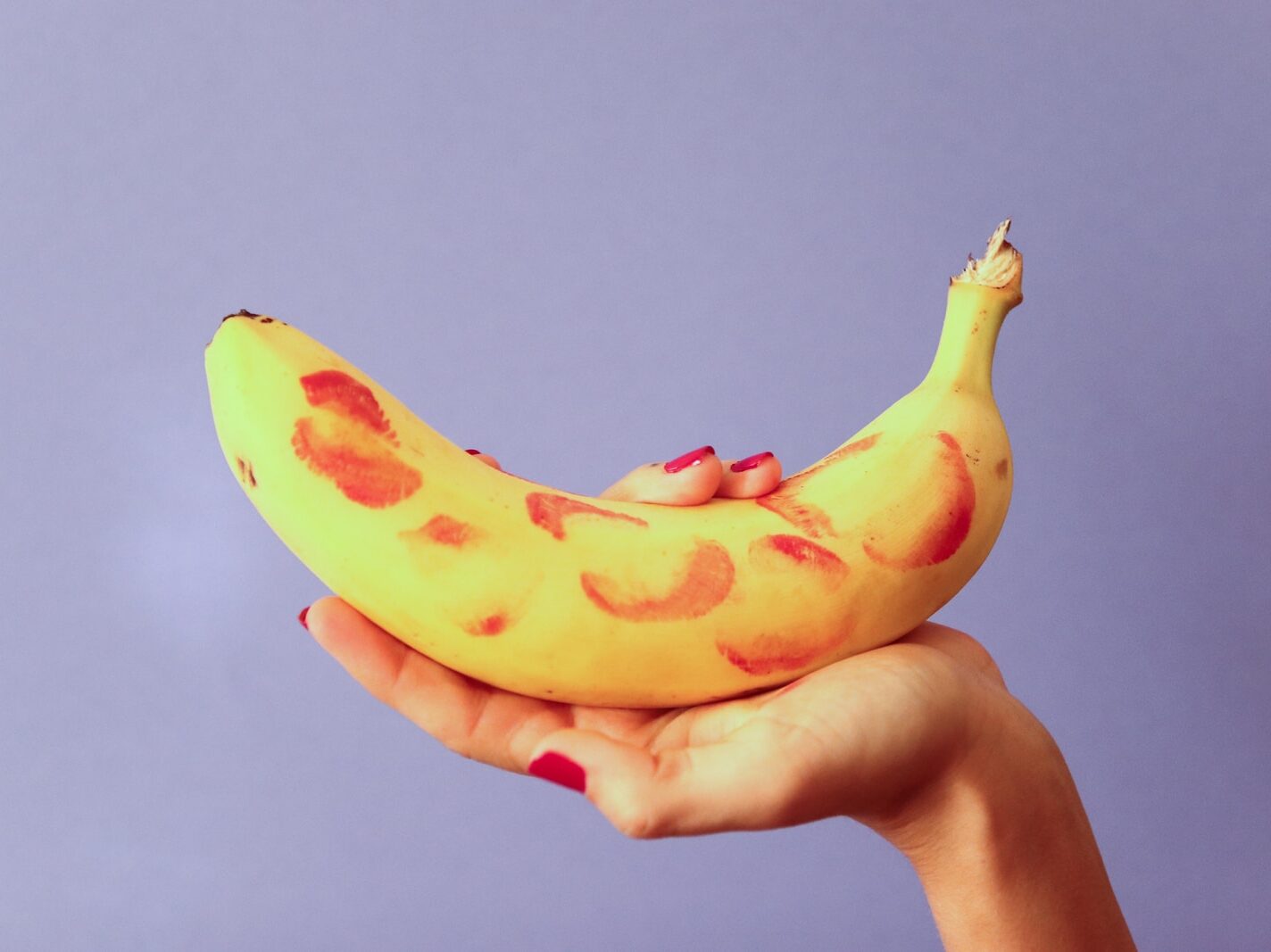 person holding yellow banana fruit