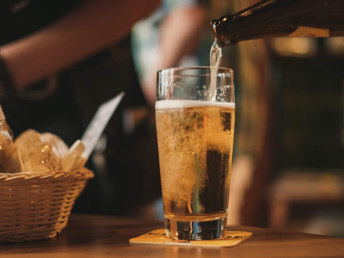 clear drinking glass with beer