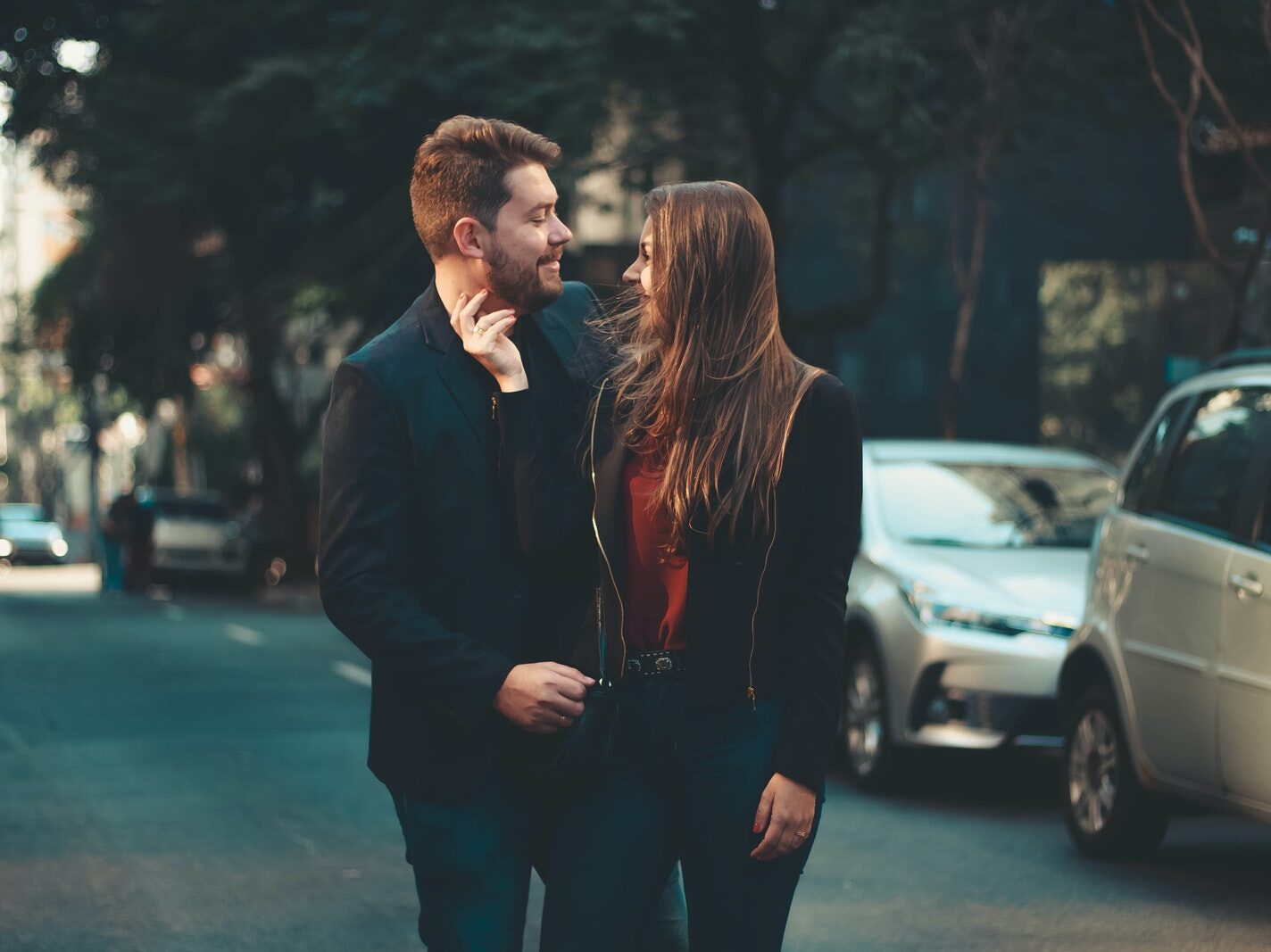 Romantic young couple bonding on street