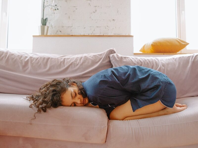 Woman Suffering from a Stomach Pain