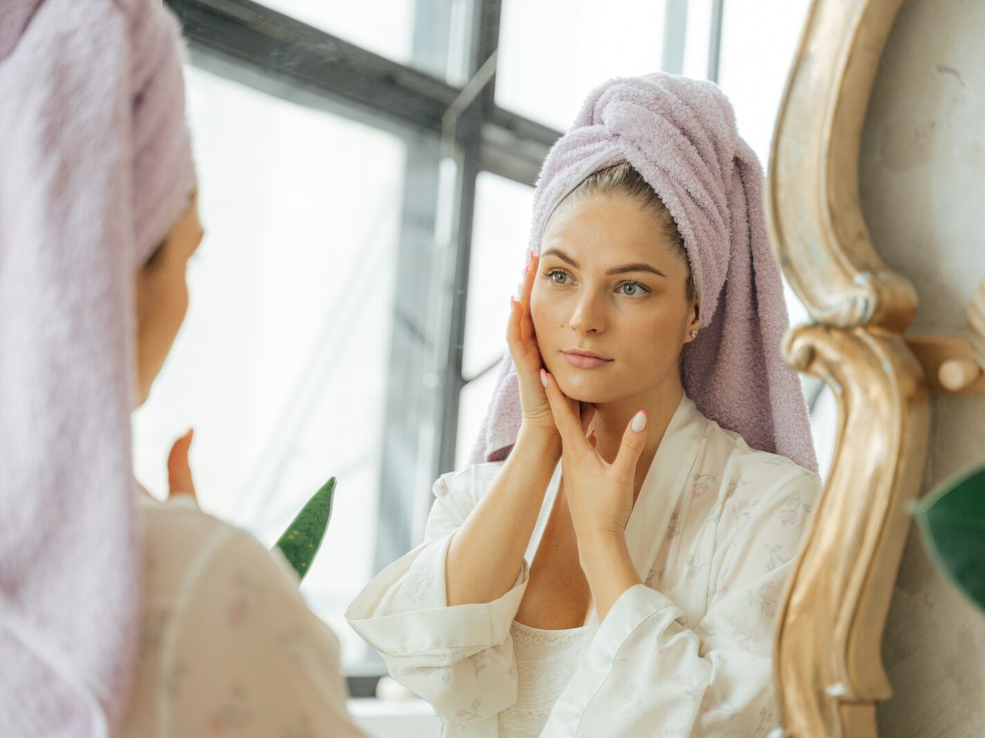 Woman in White Long Sleeve Shirt Wearing Pink Hijab