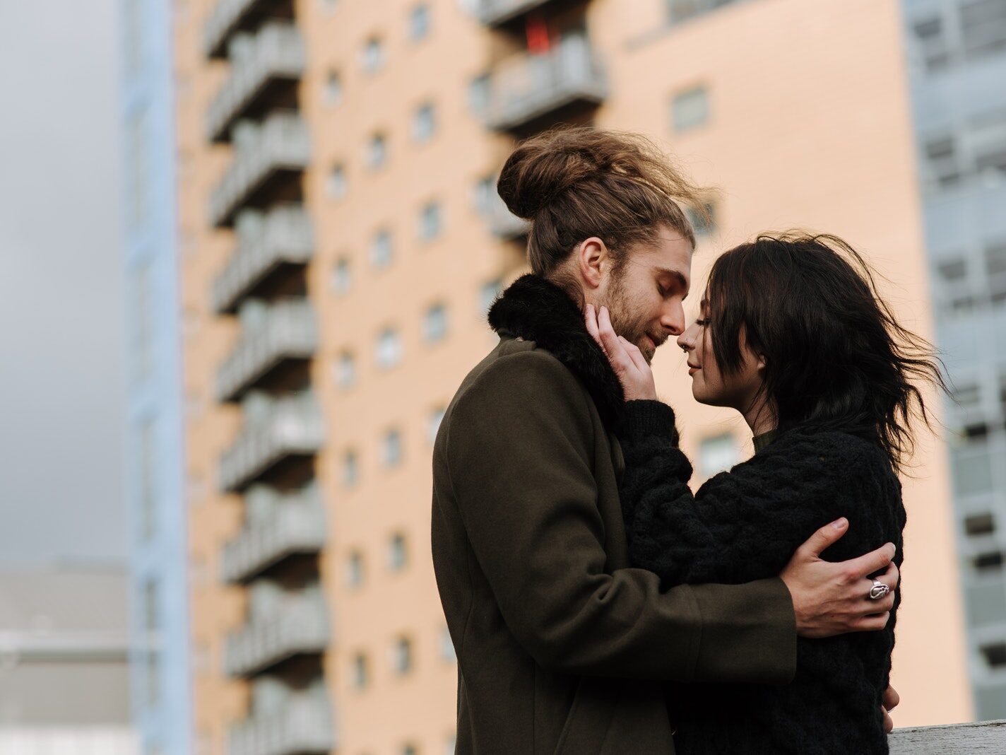 Loving couple caressing on street
