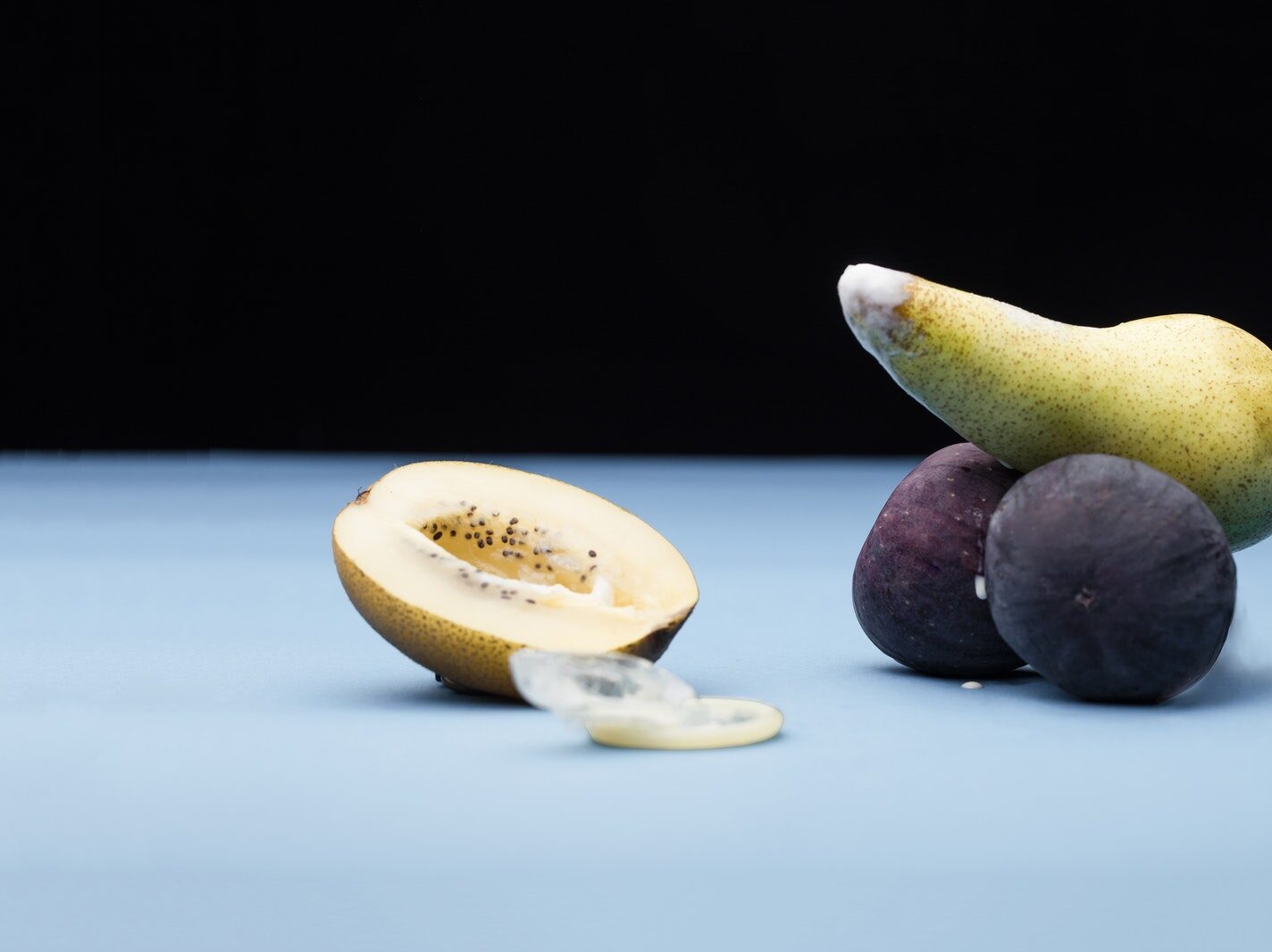 Sliced Lemon and Green Fruit