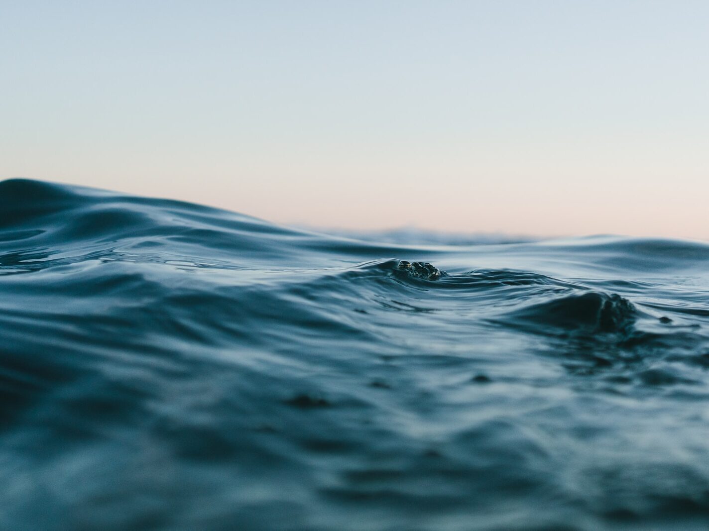 body of water under sky