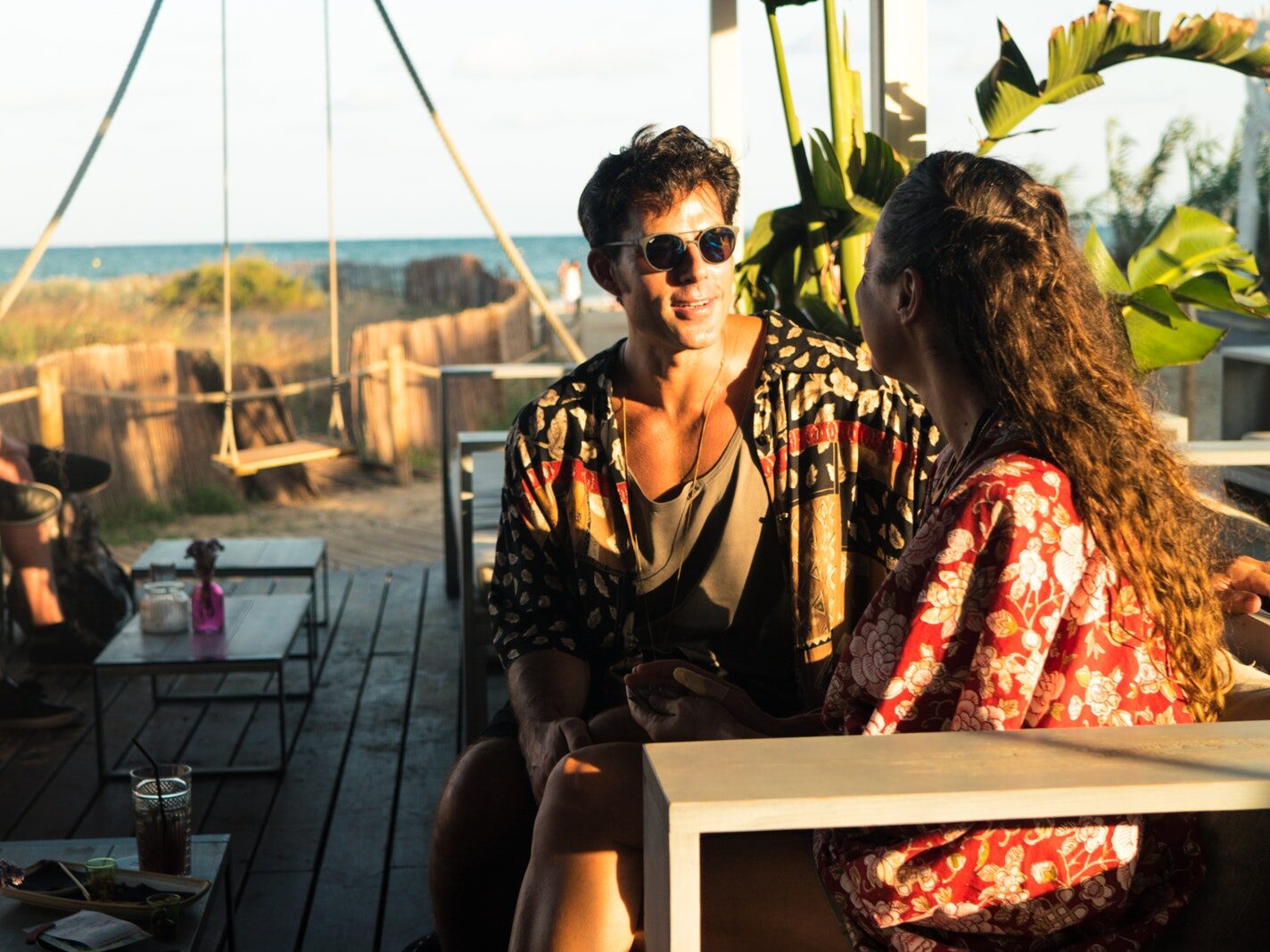 Man and Woman Sitting on Bench