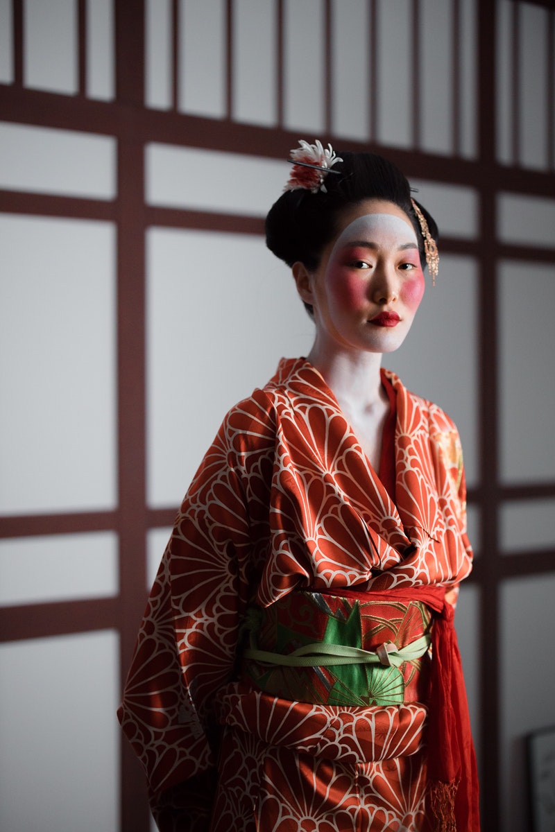 Woman in Red and White Robe