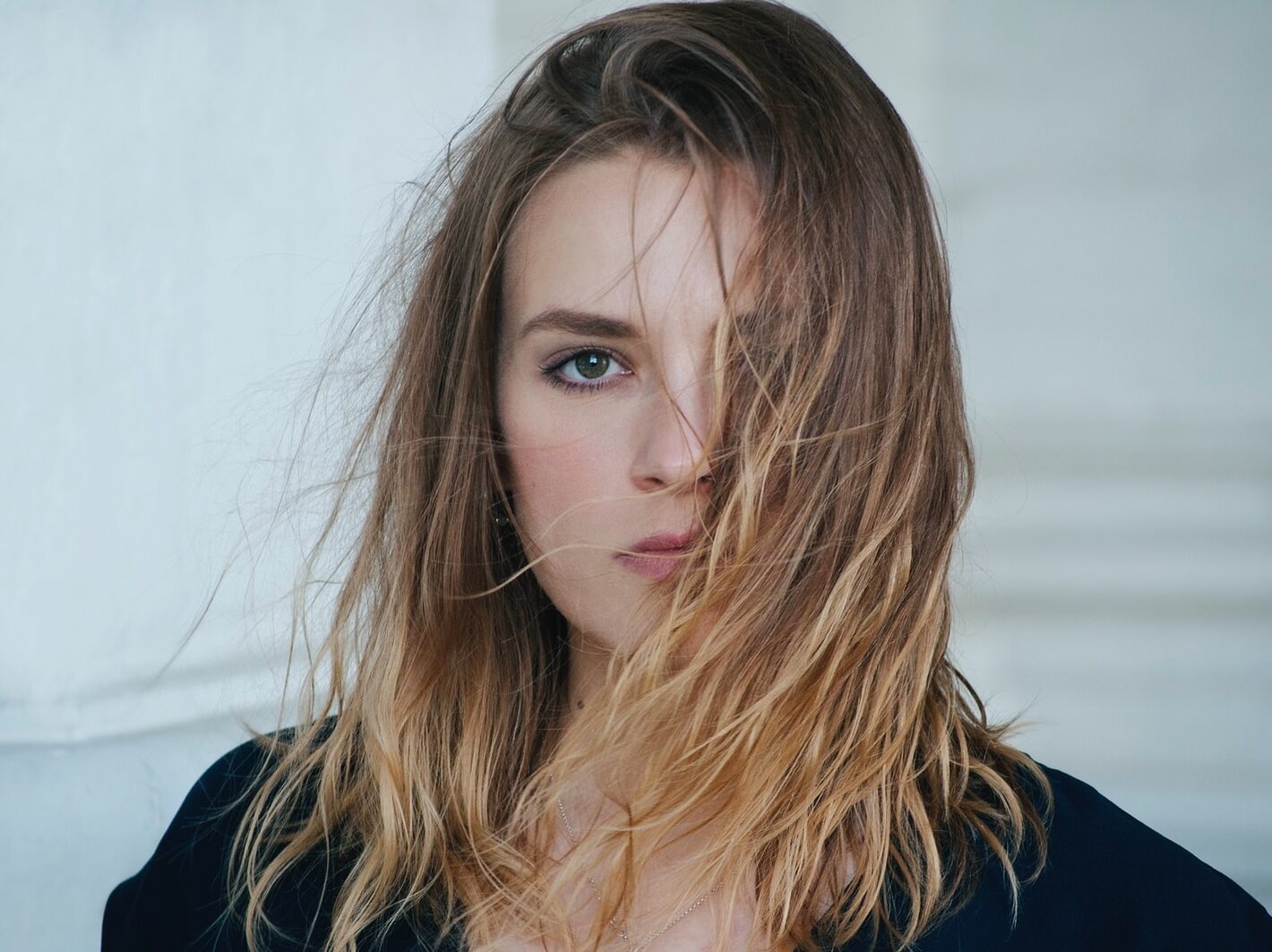 woman's hair covering her left eye