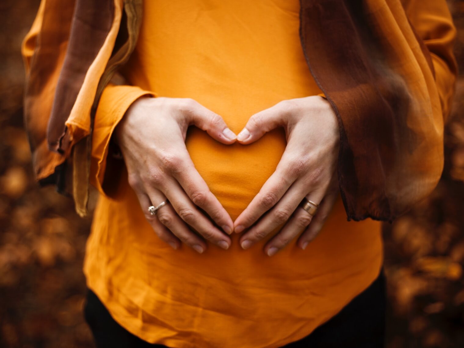 person touching stomach
