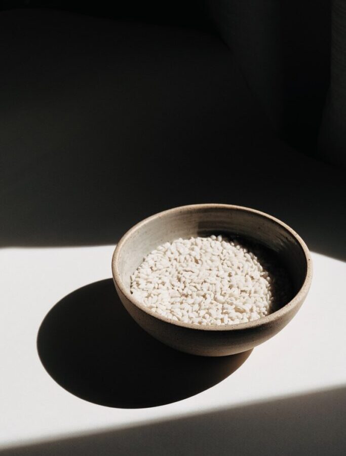 brown ceramic bowl with brown powder