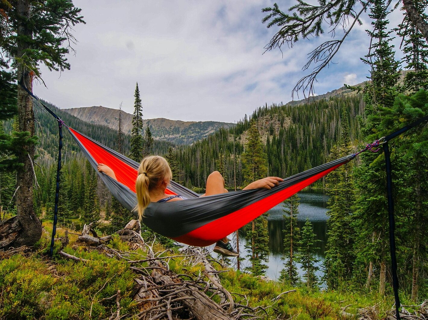 woman on hammock near to river