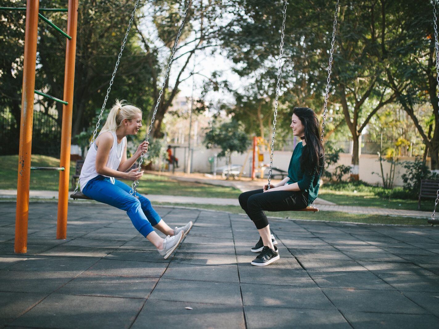 woman sitting on swing