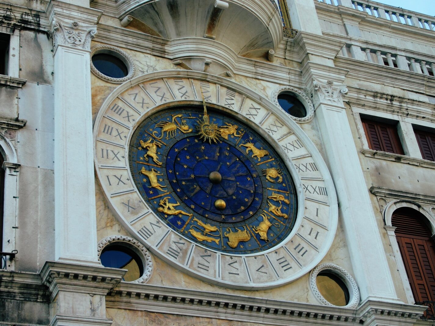 brown and black analog clock