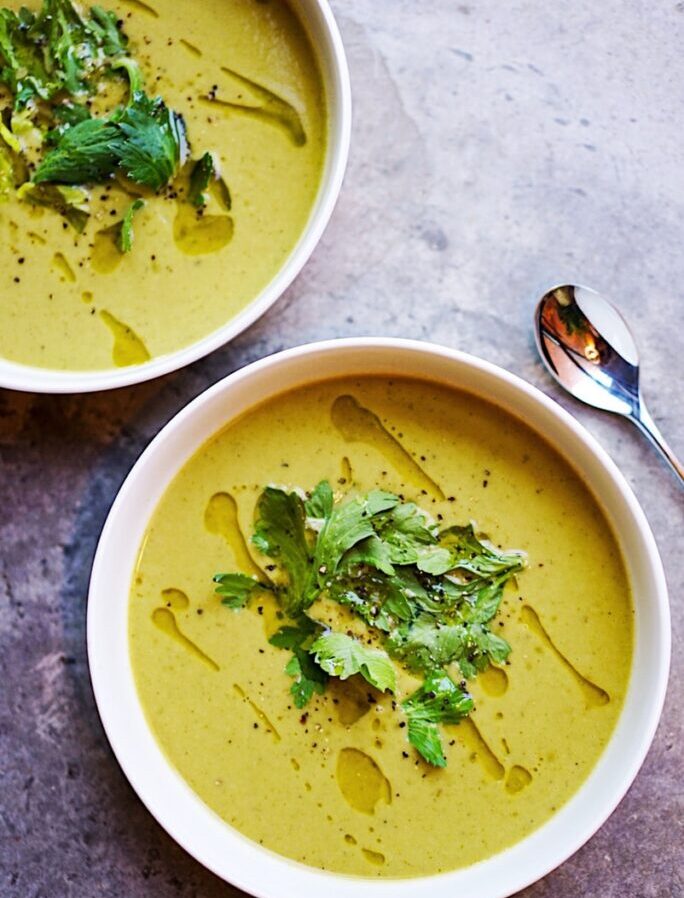 green soup on white ceramic bowl