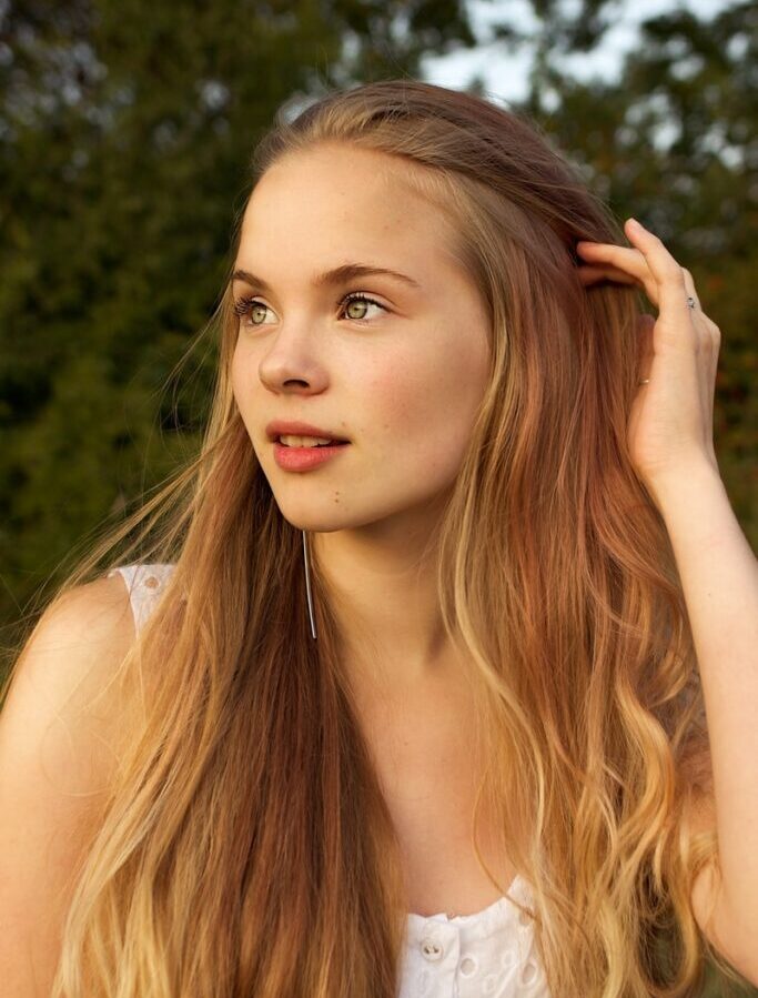 woman in white floral tank top