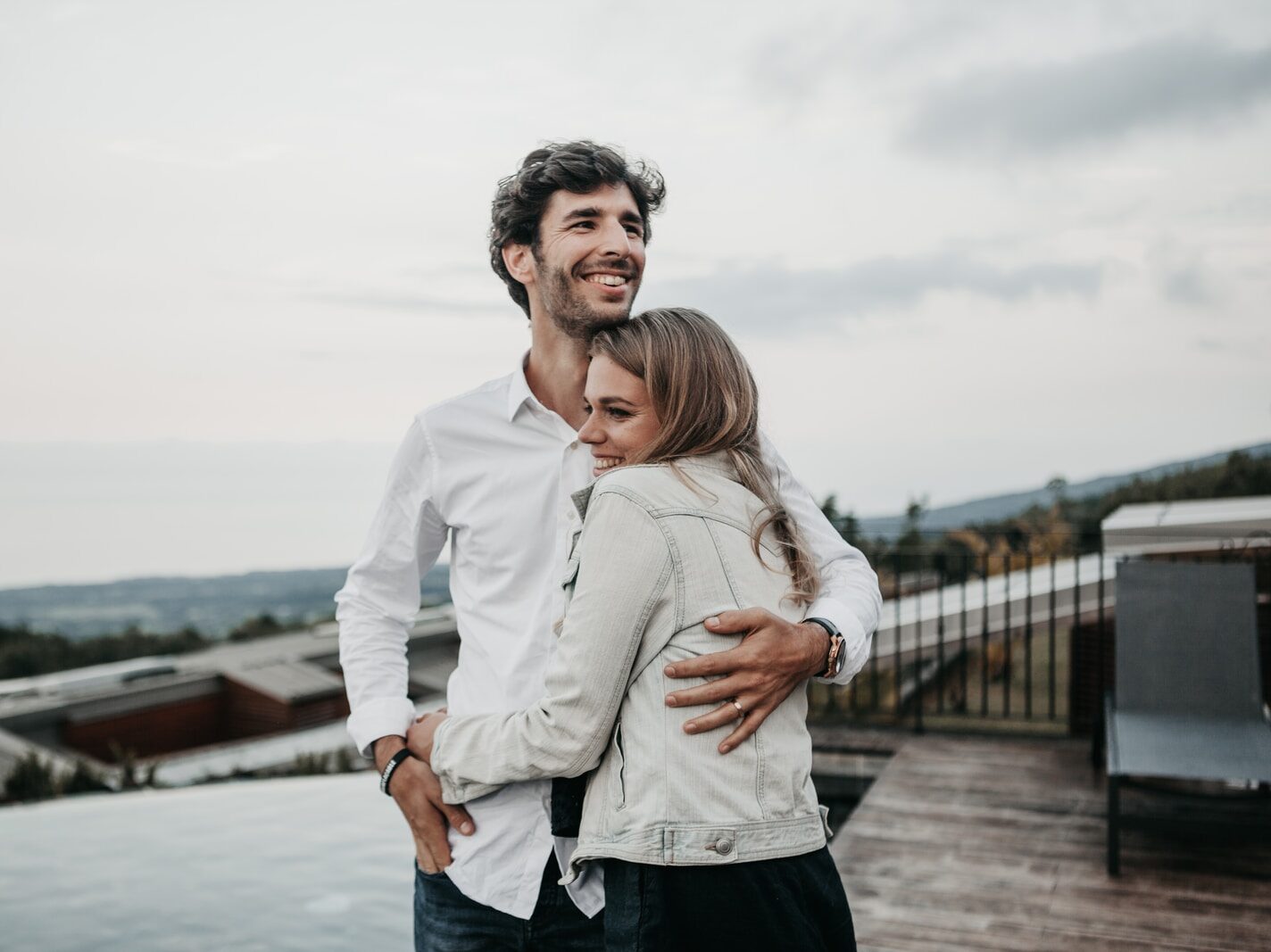 man and woman hugging each other