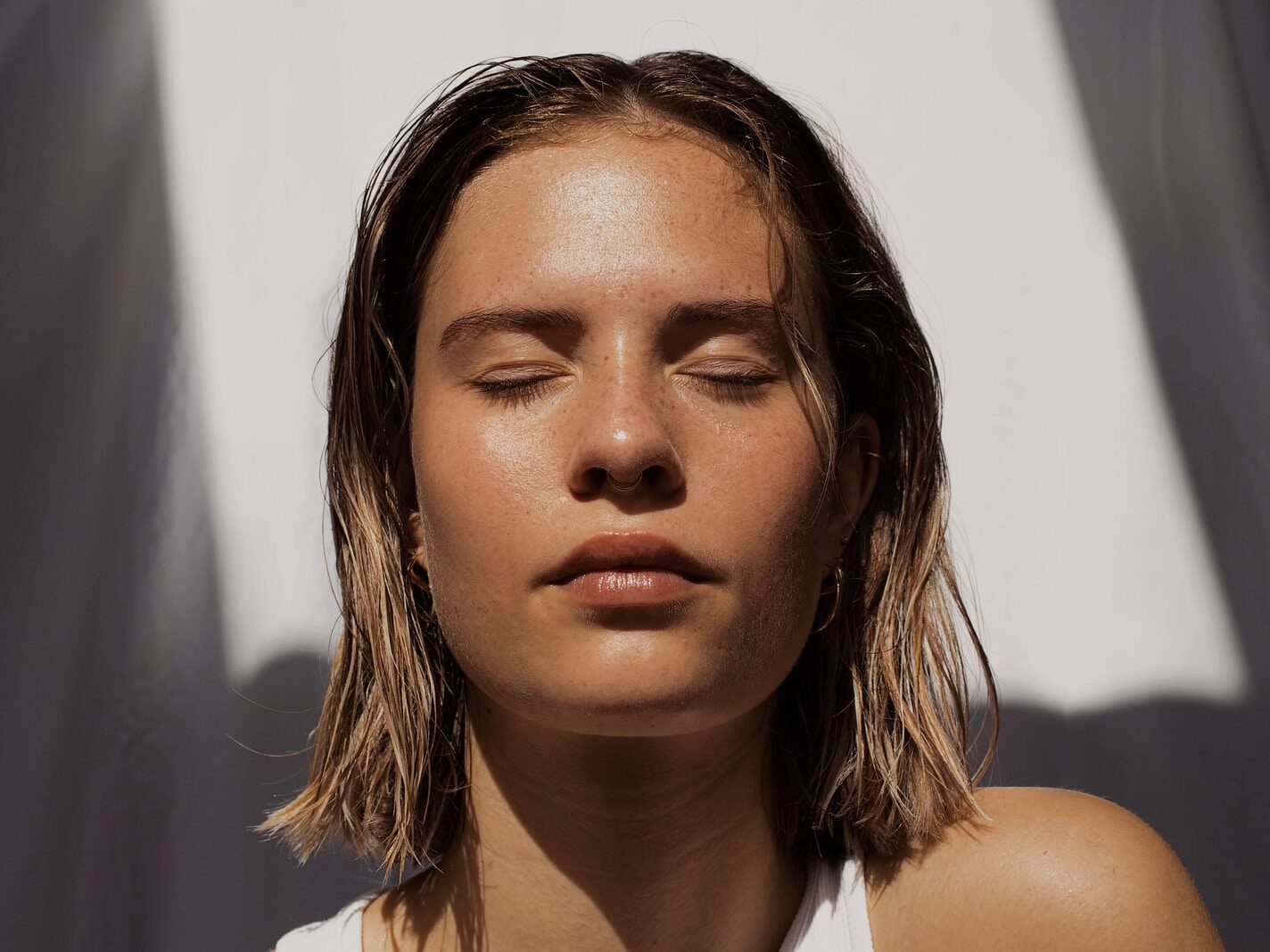 woman in white tank top