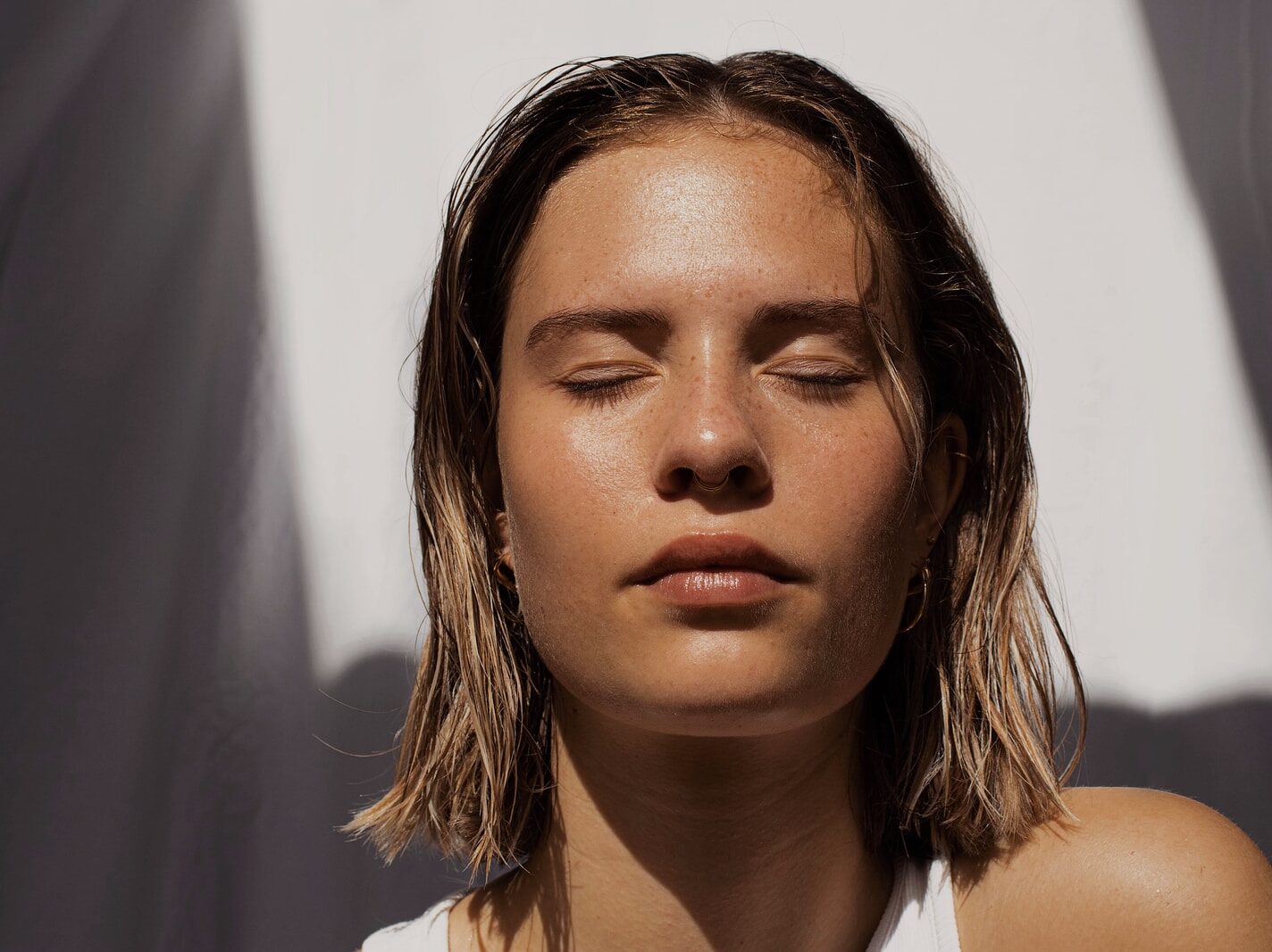 woman in white tank top