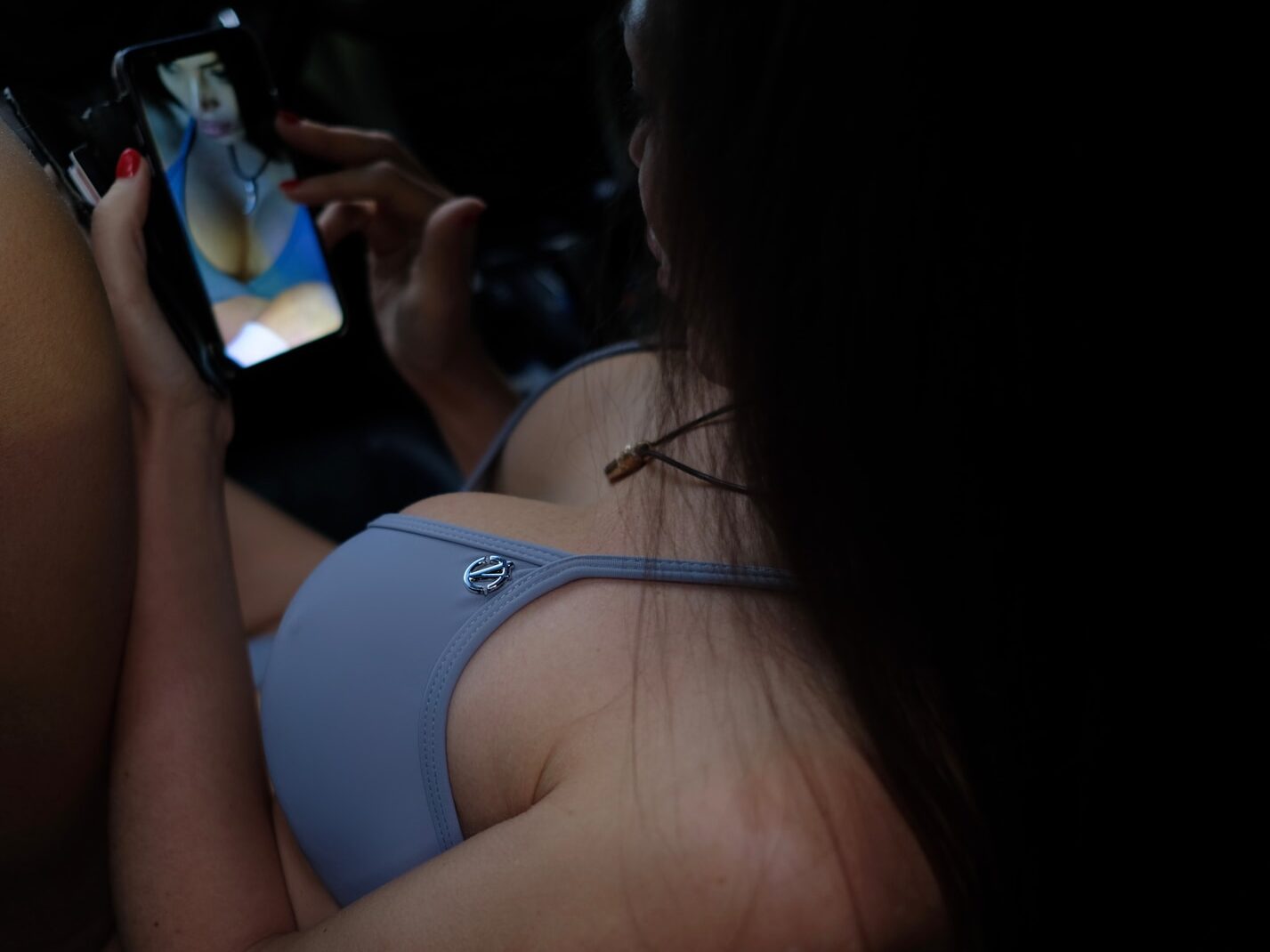 woman wearing blue bra