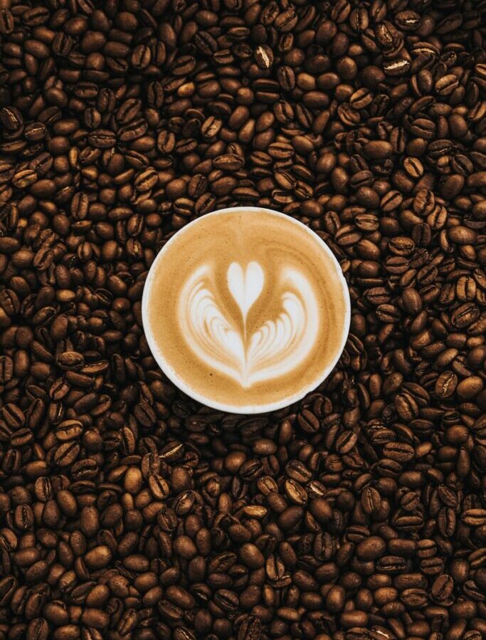 top view photography of heart latte coffee