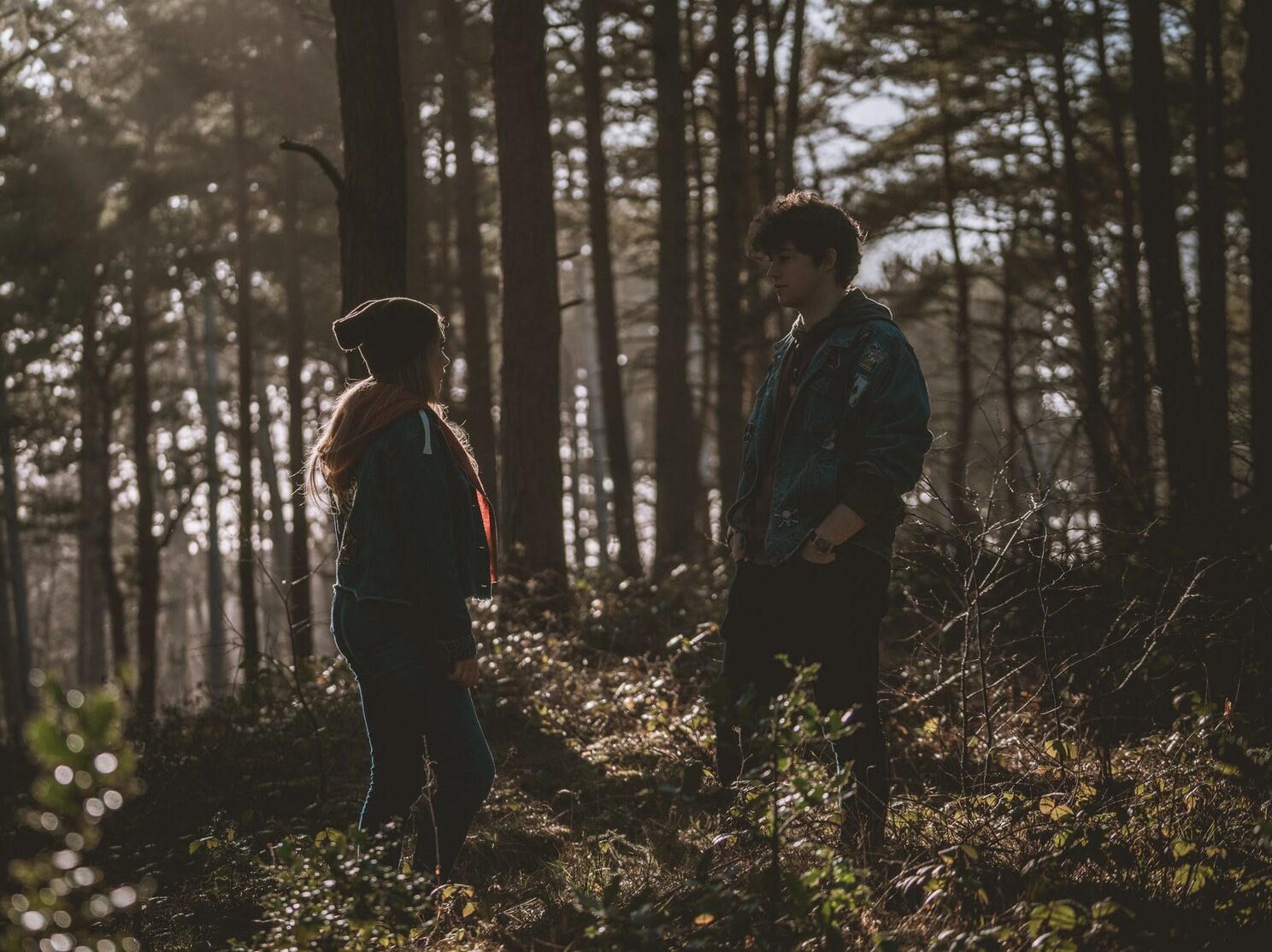 couple in woods during daytime