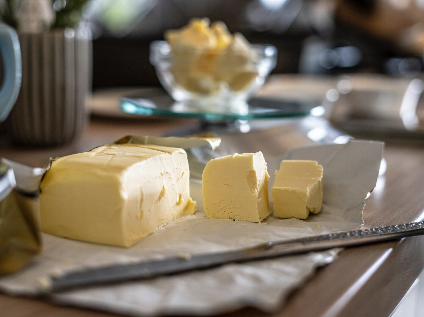 sliced cheese on clear glass plate