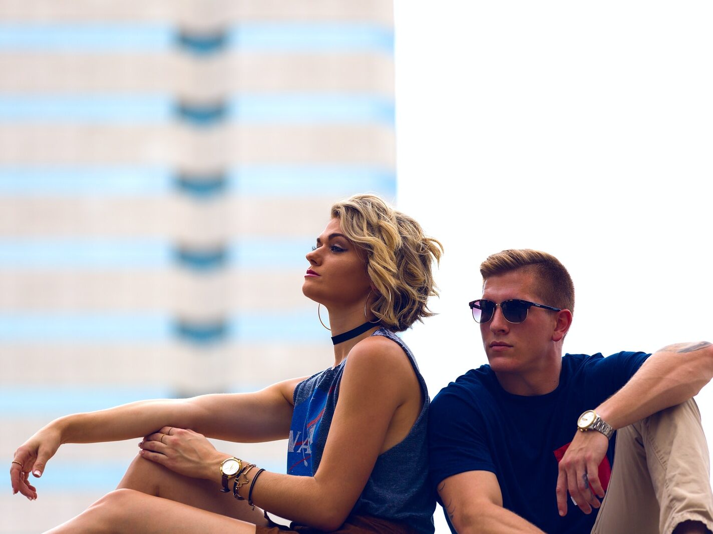 man and woman sitting posing for photo