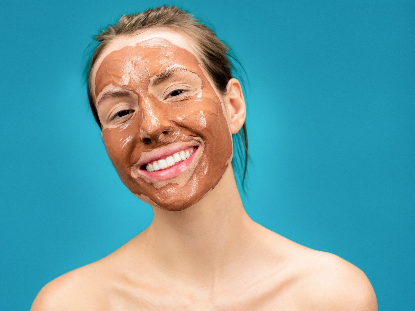 Woman With Clay Mask on Face