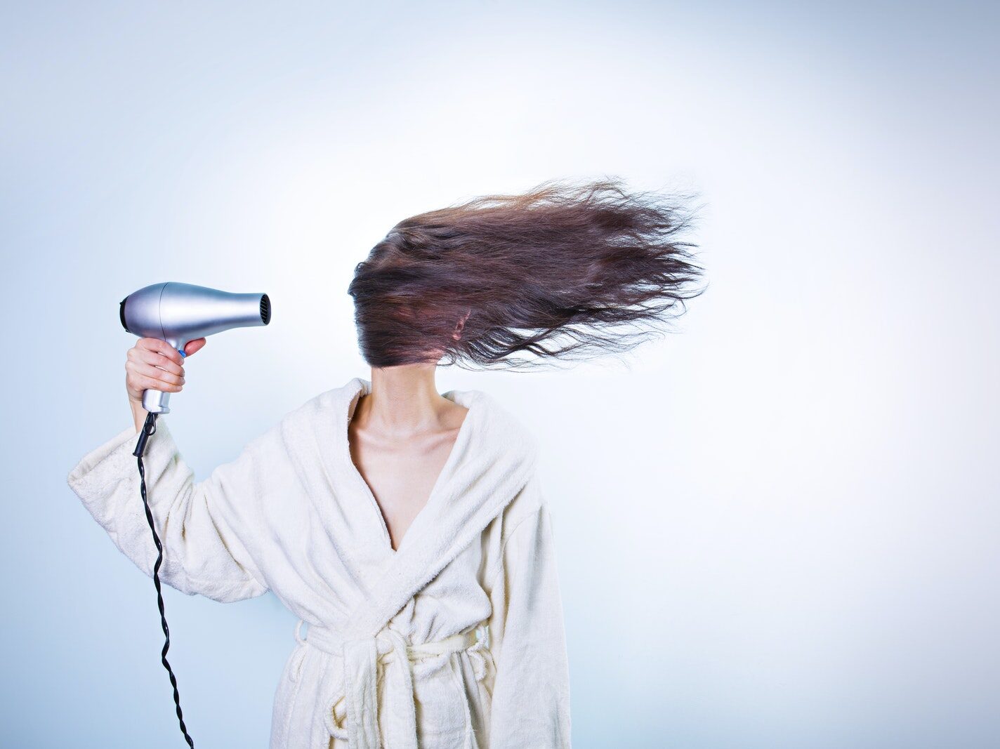 - ČasProŽeny.cz Woman Holding Gray Hair Dryer and Wearing White Bathrobe