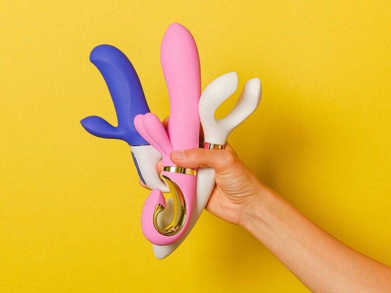 Hand Holding Sex Toys