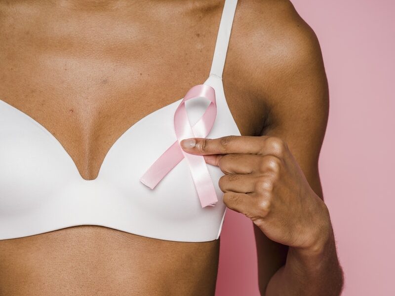 Woman Holding A Pink Ribbon