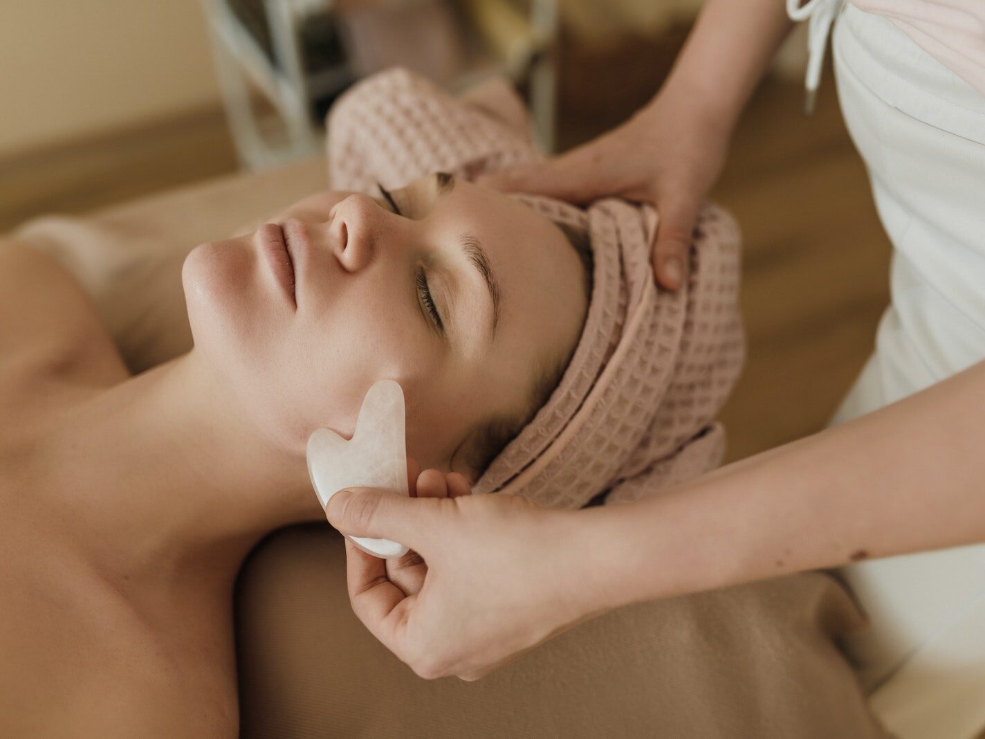 A Woman Having a Facial Treatment