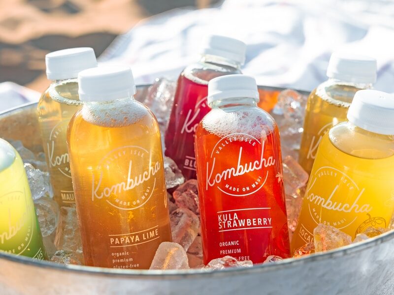 orange juice bottle on stainless steel bucket