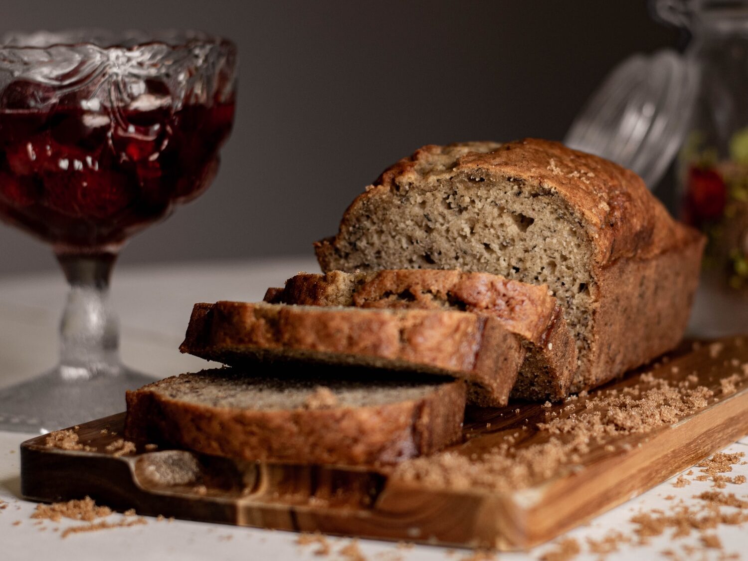 sliced bread on brown wooden chopping board