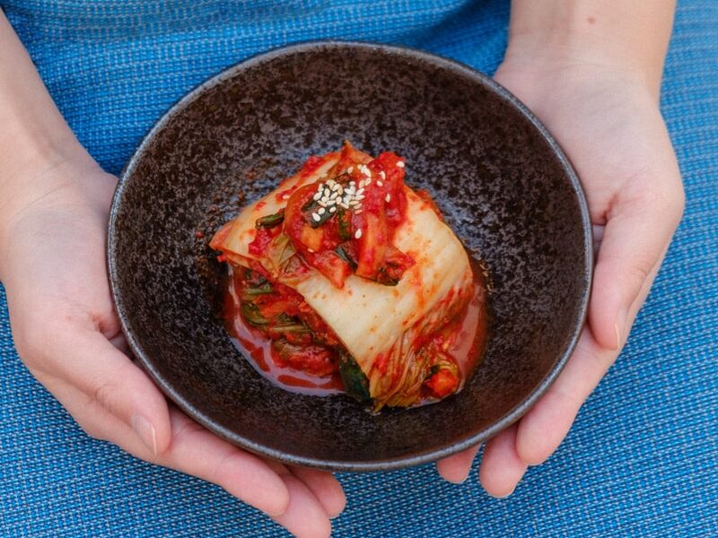 - ČasProŽeny.cz black ceramic bowl on blue textile