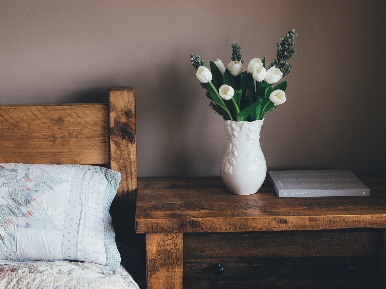 white flower vase on surface