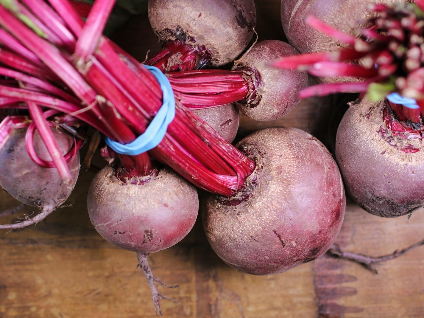 turnips on brown wooden surface