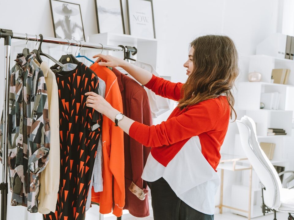 A Woman Selecting a Clothes