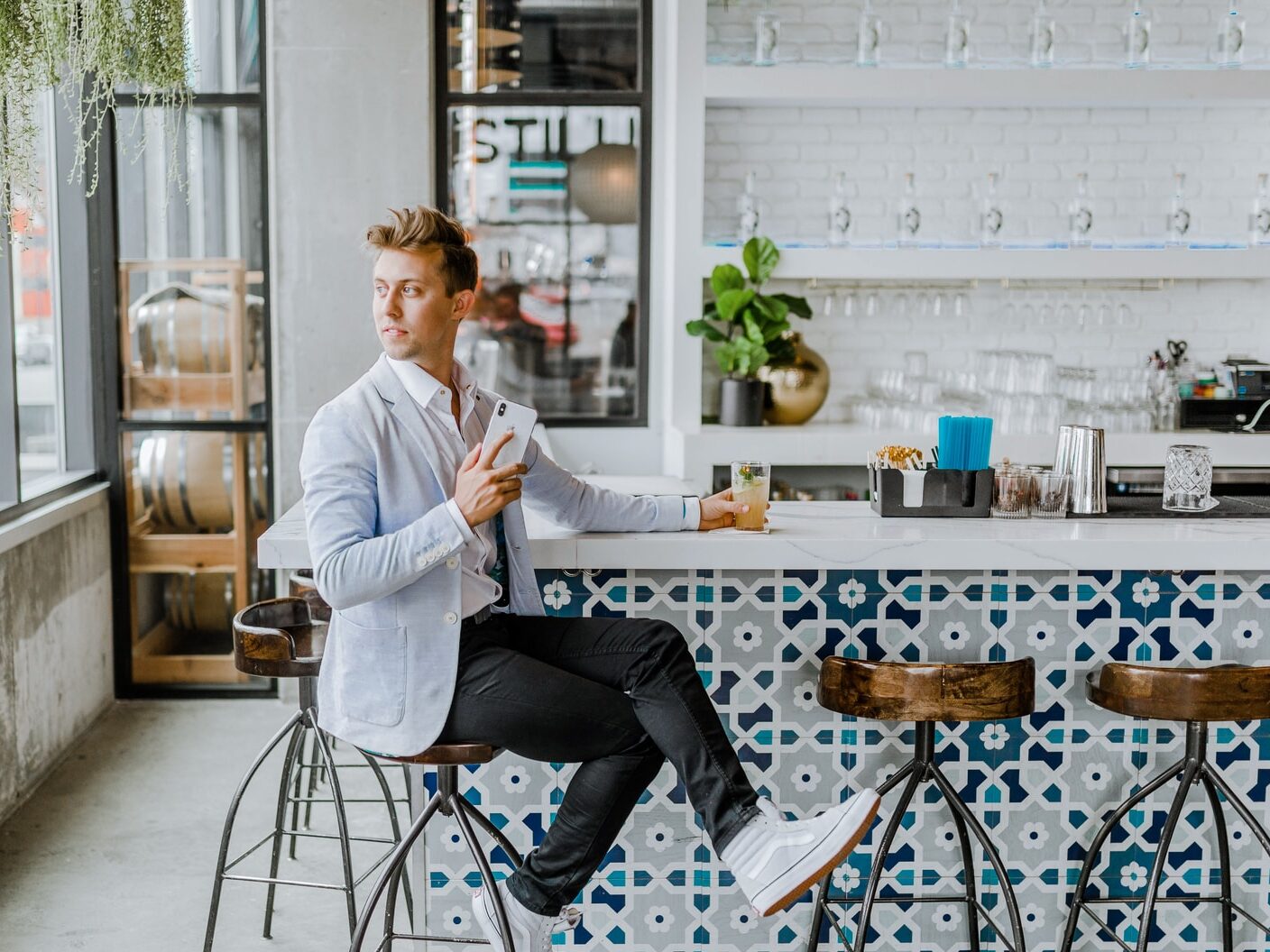 man sitting on stool
