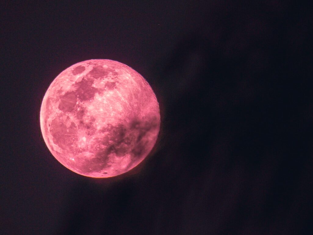 full moon in dark night sky