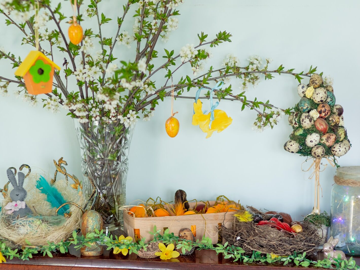 yellow flowers on brown wooden table