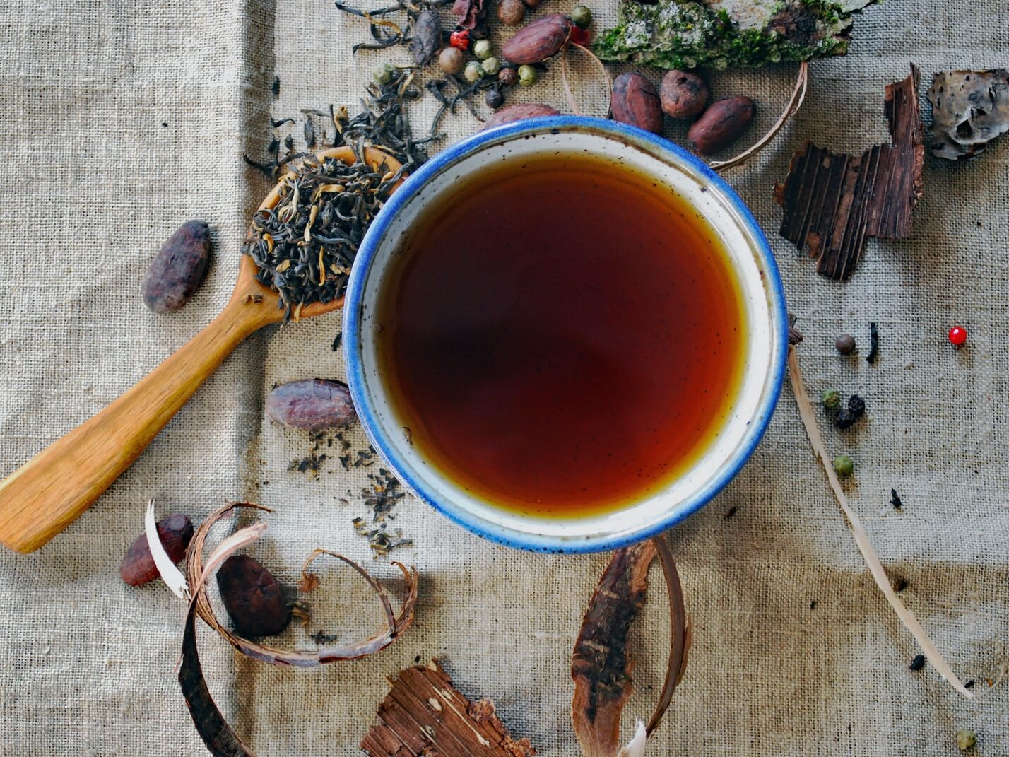 white and brown ceramic mug